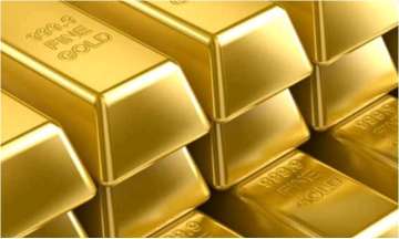 Gold futures drop marginally on weak global cues