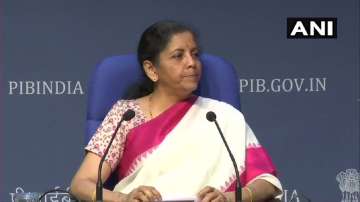 Union Finance Minister Nirmala Sitharaman takes a question during her press briefing on Friday