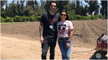 Sunny Leone poses with husband Daniel Weber as they go to pick veggies from their farm in US, see pi