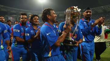 Sachin Tendulkar with World Cup trophy in 2011