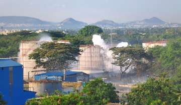Vapour billows out from LG Polymers industry after a major chemical gas leak, in RR Venkatapuram