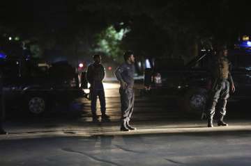 Afghan police arrive at the site of a bombing in a mosque in Kabul, Afghanistan, Tuesday, June 2, 20