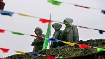 A representational image Chinese soldiers maintaining vigil from their positions near the international border between India and China at the opening of the Nathu La Pass, in the northeastern Indian state of Sikkim, July 6, 2006 (file photo)