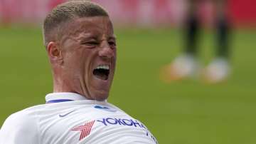 Chelsea's Ross Barkley celebrates after scoring his side's opening goal during the FA Cup sixth round soccer match between Leicester City and Chelsea at the King Power Stadium in Leicester