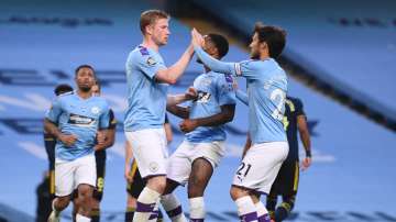 Clinical Manchester City beat 10-man Arsenal 3-0 as Premier League returns