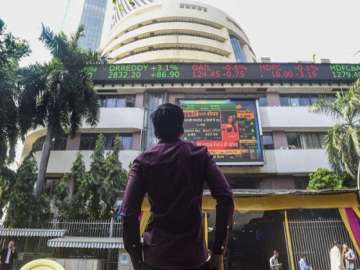 Sensex drops 210 pts on weak global cues