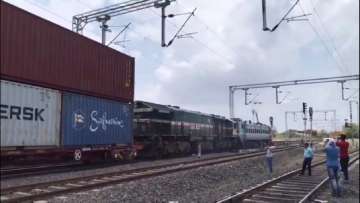 Railways successfully runs double stack container trains in electrified territory