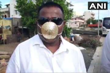 Shankar Kurade, a resident of Pimpri-Chinchwad of Pune district, has got himself a mask made of gold