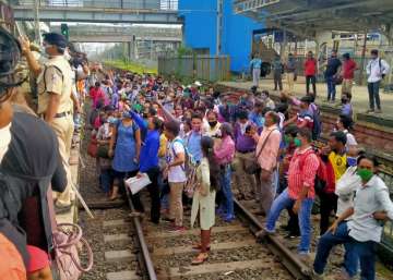 Rush of private companies commuters seen at Nalasopara railway station after state buses restricted the number of passengers 