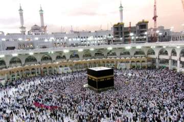  Muslim pilgrims walk around the Kaaba, the cubic building at the Grand Mosque, during the annual hajj pilgrimage, in Mecca, Saudi Arabia.