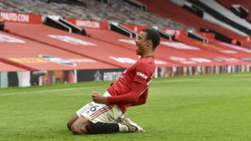 Manchester United's Mason Greenwood celebrates after scoring a goal during the English Premier League soccer match between Manchester United and Bournemouth at Old Trafford stadium in Manchester, England, Saturday, July 4