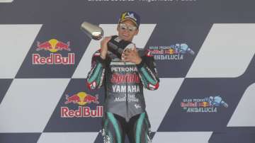 Yamaha rider Fabio Quartararo of France holds the trophy after winning the MotoGP race during the Andalucia Motorcycle Grand Prix at the Angel Nieto racetrack in Jerez de la Frontera, Spain, Sunday July 26