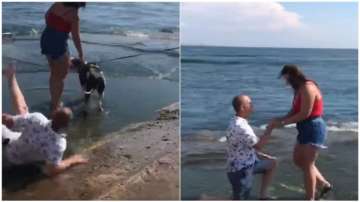 Man literally falls in love as he slips on beach before proposing, video goes viral