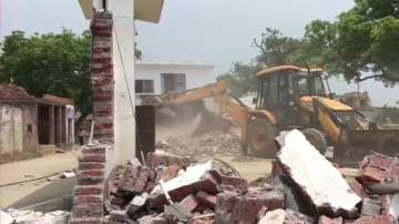 House of history-sheeter Vikas Dubey, the main accused in Kanpur encounter case, house demolished by district administration.