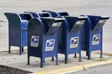 Mailboxes in Omaha, Neb., Tuesday, Aug. 18, 2020. The Postmaster general announced Tuesday he is hal