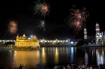 Amritsar: Fireworks light up the night sky over Harmandir Sahib (the Golden Temple) on the occasion of 416th anniversary of the installation of Guru Granth Sahib, in Amritsar, Wednesday, Aug 19, 2020.?