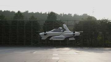 This photo taken at the beginning of August, 2020 and released by ?SkyDrive/CARTIVATOR 2020, shows a test flight of a manned '"flying car" at Toyota Test Field in Toyota, central Japan. Japan’s SkyDrive Inc., among the myriads of “flying car” projects around the world, has carried out a successful though modest test flight with one person aboard.?