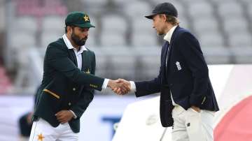 England captain Joe Root shakes hands with Pakistan captain Azhar Ali during the toss prior to Day One of the 1st #RaiseTheBat Test Match between England and Pakistan at Emirates Old Trafford on August 05, 2020 in Manchester, England.