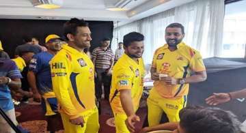 Suresh Raina with Chennai Super Kings' teammates Mahendra Singh Dhoni and Murali Vijay