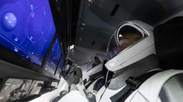 SpaceX capsule returns with 2 NASA astronauts from space station