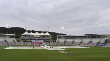 The pitch area is seen covered after rain stopped play on the fourth day of the second cricket Test match between England and Pakistan, at the Ageas Bowl in Southampton, England, Sunday, Aug. 16