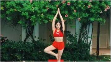 ‘If only peace, serenity and green truly made you wiser’, says Sara Ali Khan as she does yoga by swi
