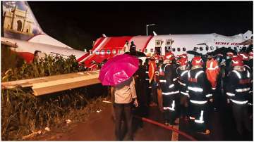 Kozhikode: Rescue operation underway after an Air India Express flight with passengers on board en route from Dubai skidded off the runway while landing, at Karippur in Kozhikode, Friday, Aug 7, 2020.