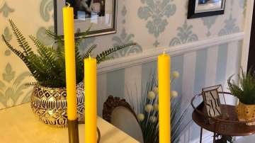 Vastu Tips: Place yellow colored candle in South-West direction. Here's why