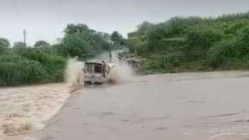 Truck swept away in rain-fed river in Banswara; video surfaces