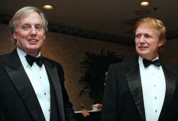 FILE - In this Nov. 3, 1999, file photo, Robert Trump, left, joins then real estate developer and presidential hopeful Donald Trump at an event in New York. President Donald Trump's younger brother, Robert Trump, a businessman known for an even keel that seemed almost incompatible with the family name, died Saturday night, Aug. 15, 2020, after being hospitalized in New York, the president said in a statement. He was 71. The president visited his brother at a New York City hospital Friday after White House officials said Robert Trump had become seriously ill. 