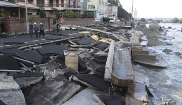 A coastal road is damaged in Ulsan, South Korea, Monday, Sept. 7, 2020. A powerful typhoon damaged b