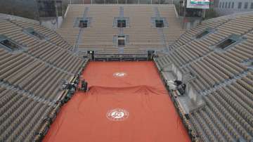 View of the empty seats on Suzanne Lenglen court as rain suspended most matches in the first round of the French Open tennis tournament at the Roland Garros stadium in Paris, France, Monday, Sept. 28