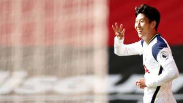 Tottenham's Son Heung-min celebrates after scoring his side's fourth goal during the English Premier League soccer match between Southampton and Tottenham Hotspur at St. Mary's Stadium in Southampton, England, Sunday, Sept. 20
