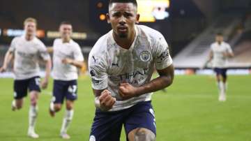Manchester City's Gabriel Jesus celebrates after scoring his team's third goal during the English Premier League soccer match between Wolverhampton Wanderers and Manchester City at Molineux Stadium in Wolverhampton, England, Monday, Sept. 21