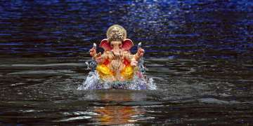 Mumbai: Devotees bid farewell to Lord Ganesh in subdued manner
