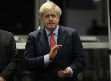 COVID might continue to spike till Christmas and beyond: British PM Johnson