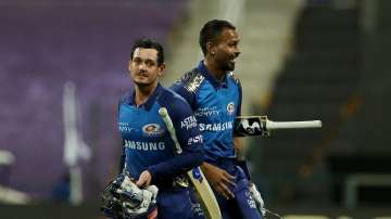 Mumbai Indians cruised past Kolkata Knight Riders with an eight-wicket win to go top of the table in