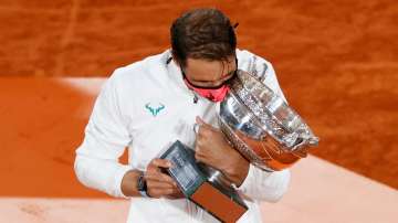 Rafael Nadal hugs his French Open title