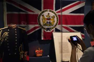 The standard and uniform of the former British Governors of Hong Kong, are displayed at the exhibiti