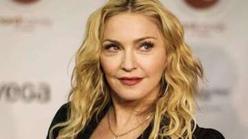 Madonna on directing her  biopic: 'Big script' for a 'big life'