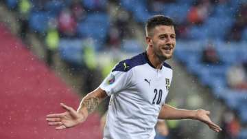 Serbia's Sergej Milinkovic-Savic cheers after his and Serbia's second goal during the Euro 2020 playoff semifinal soccer match between Norway and Serbia at Ullevaal Stadium, in Oslo, Norway, Thursday, Oct. 8