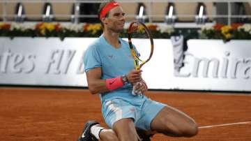 Spain's Rafael Nadal celebrates winning the final match of the French Open tennis tournament against Serbia's Novak Djokovic in three sets, 6-0, 6-2, 7-5, at the Roland Garros stadium in Paris, France, Sunday, Oct. 11