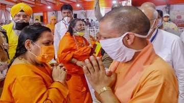 Senior BJP leader Uma Bharti and Uttar Pradesh Chief Minister Yogi Adityanath