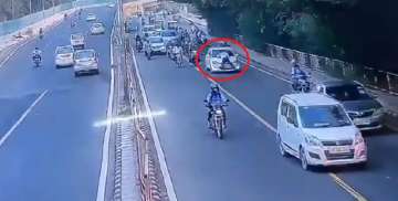 Delhi cop dragged, dhaula kuan, delhi cop dragged on car bonnet, delhi traffic police cop, dhaula ku