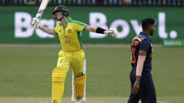 Australia's Steve Smith reacts while batting during the one day international cricket match between India and Australia at the Sydney Cricket Ground in Sydney, Australia, Sunday, Nov. 29