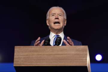 Biden says US "facing a dark winter," urges mask-wearing