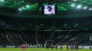 Manchester City, Olympiakos players hold a minute's silence