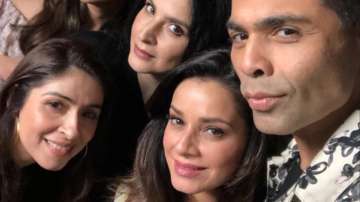 Karan Johar gives it back to troll in style who called him 'favourite wife'