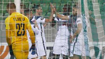 Tottenham's Harry Kane celebrates with teammates after scoring his side's first goal during the Europa League Group J soccer match between Ludogorets and Tottenham Hotspur at the Ludogorets Arena stadium in Razgrad, Bulgaria, on Thursday, Nov. 5