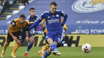 Leicester's Jamie Vardy scores his side's opening goal during the English Premier League soccer match between Leicester City and Wolverhampton Wanderers at the King Power Stadium in Leicester, England, Sunday, Nov. 8